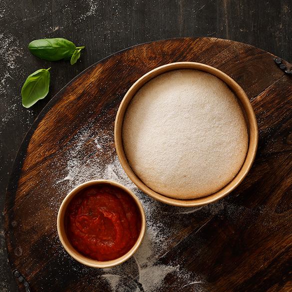 Pizza dough + tomato sauce